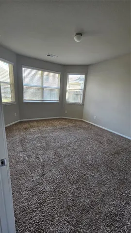 a view of empty room with window