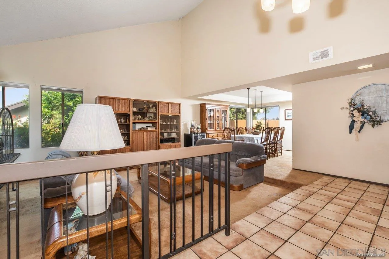 713 Roca Road Chula Vista, CA 91910 - Photo 4 of 26 a view of a living room and workspace