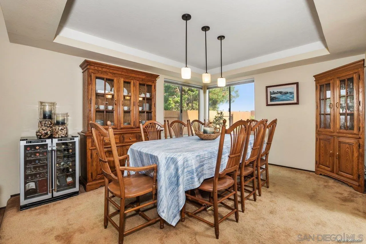 713 Roca Road Chula Vista, CA 91910 - Photo 5 of 26 a view of a dining room with furniture window and chandelier