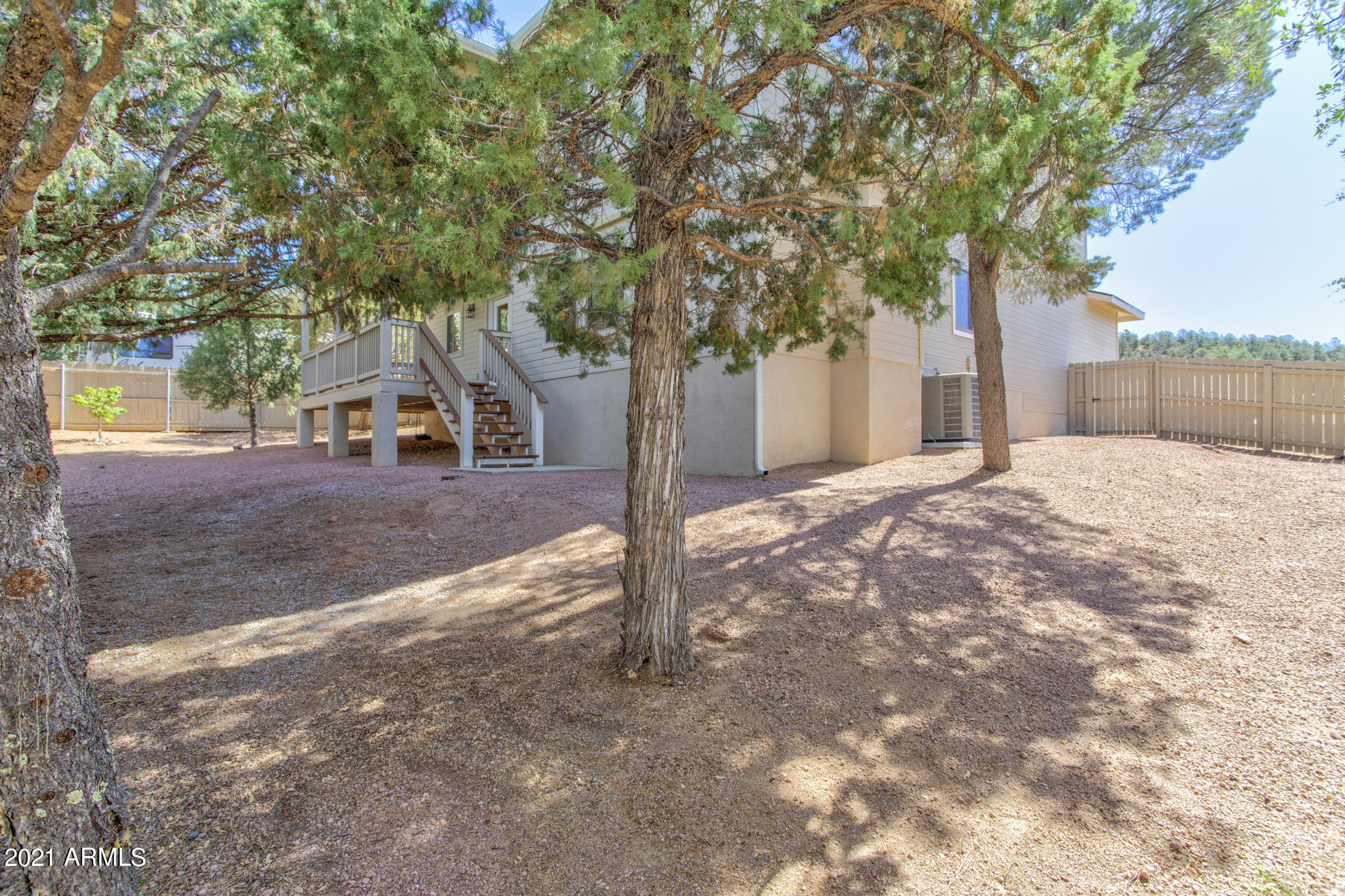 604 North Oak Ridge Road Payson, AZ 85541 - Photo 17 of 55 a house with trees in front of it