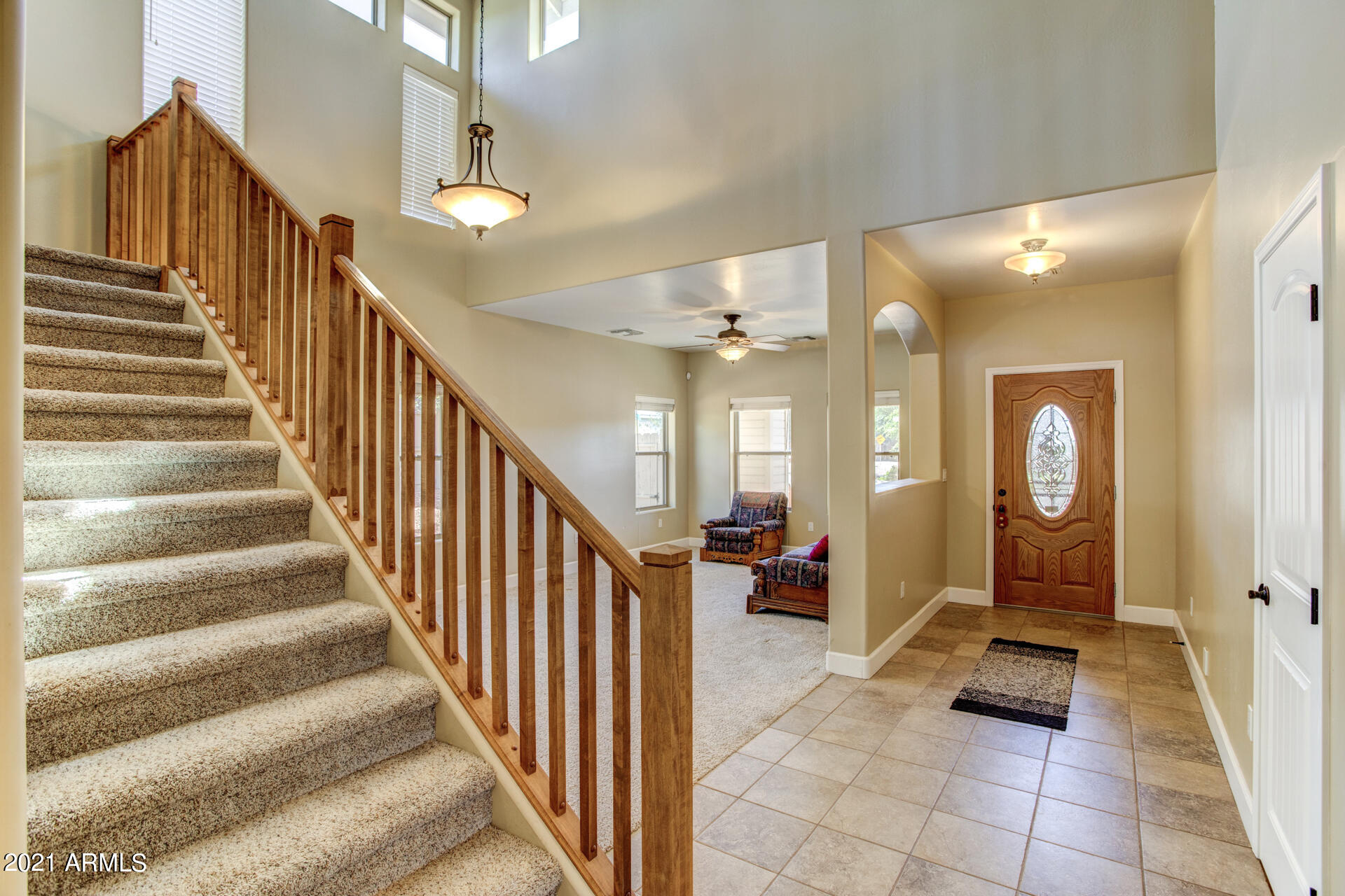 604 North Oak Ridge Road Payson, AZ 85541 - Photo 23 of 55 a view of a hallway with wooden floor and staircase