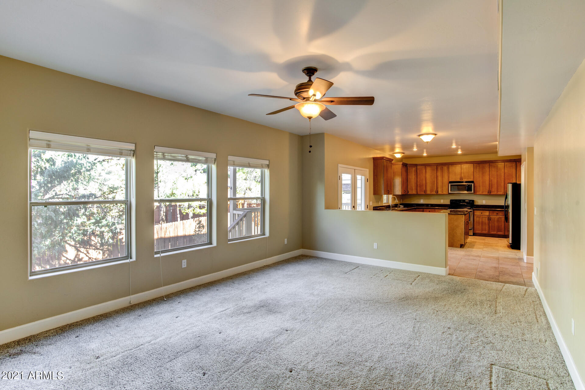 604 North Oak Ridge Road Payson, AZ 85541 - Photo 32 of 55 a view of an empty room with a kitchen