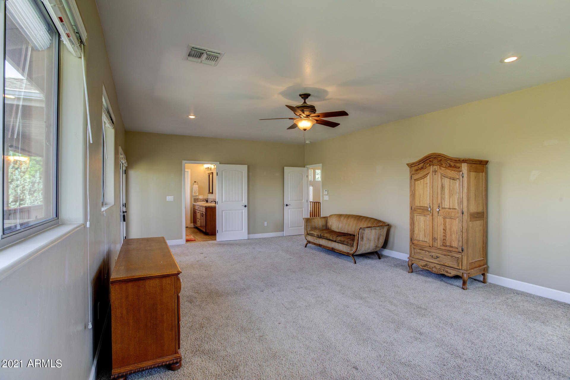 604 North Oak Ridge Road Payson, AZ 85541 - Photo 40 of 55 a living room with furniture and a chandelier