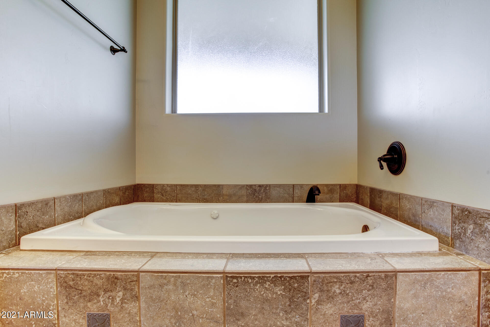604 North Oak Ridge Road Payson, AZ 85541 - Photo 42 of 55 a bathroom with a bath tub and a window