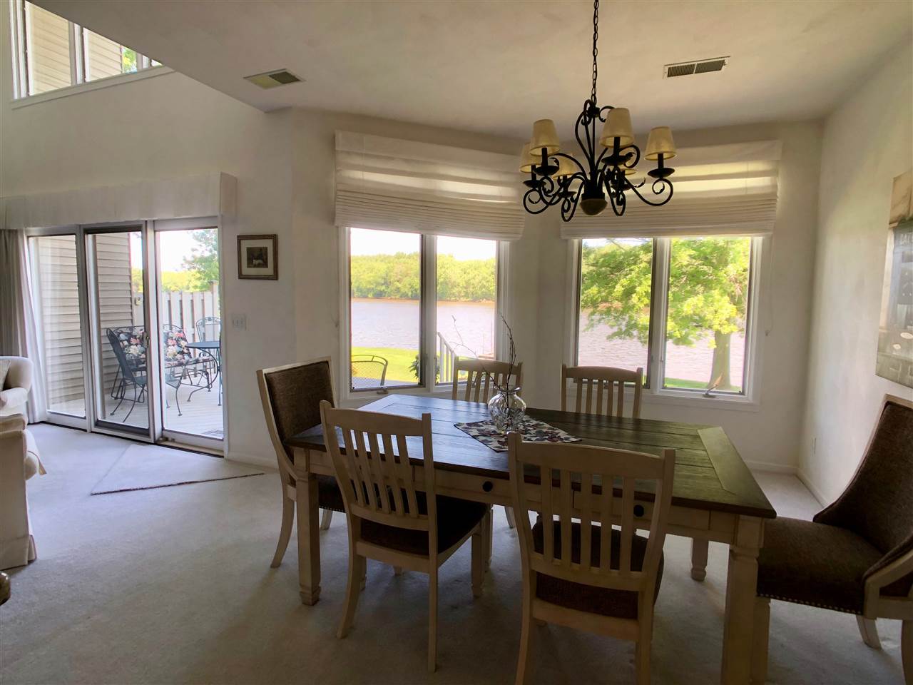 7524 North River Road Byron, IL 61010 - Photo 14 of 21 a view of a dining room with furniture window and outside view