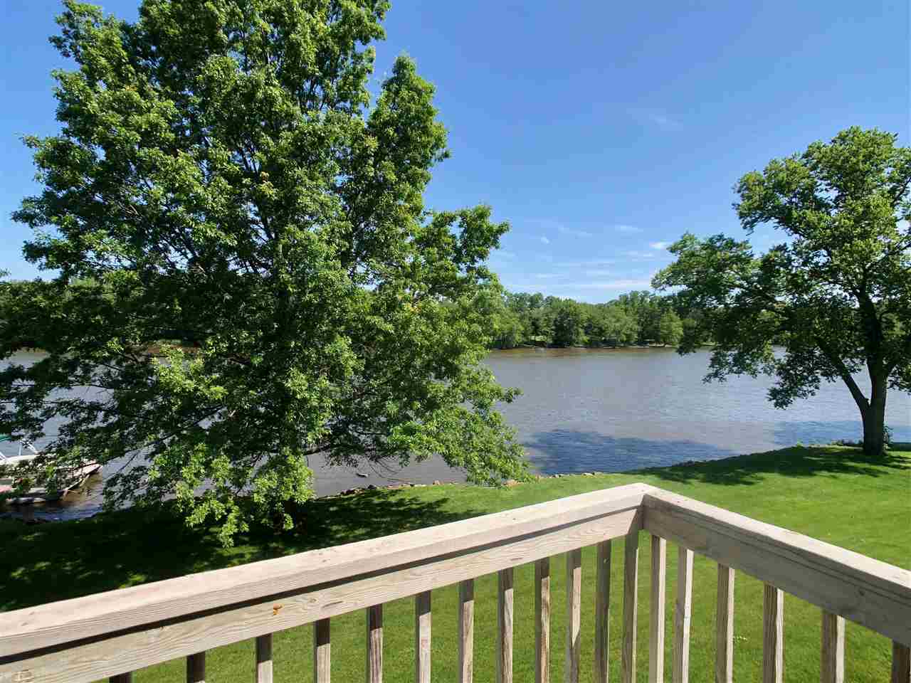 7524 North River Road Byron, IL 61010 - Photo 19 of 21 a view of lake from a yard