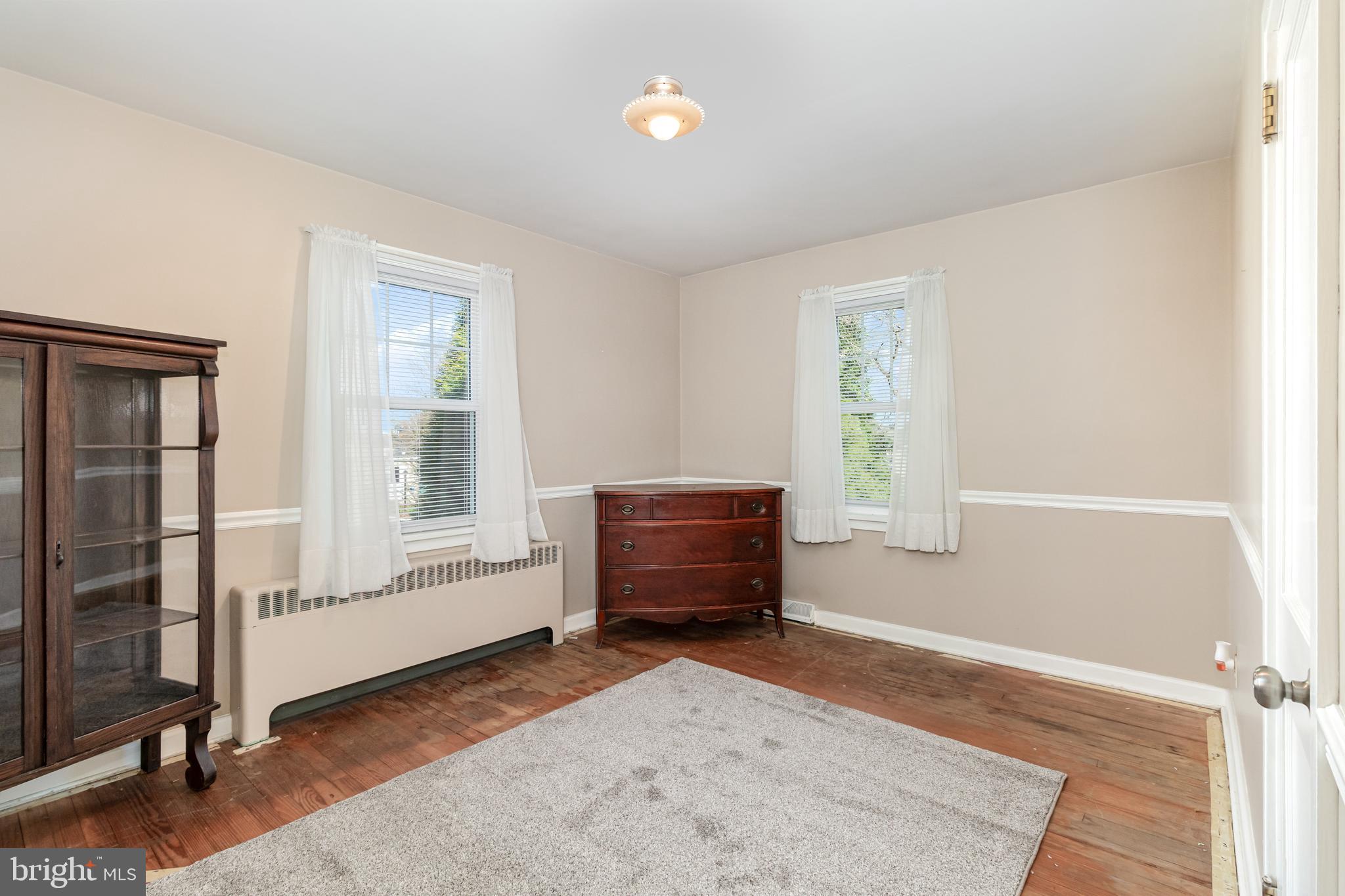 202 North Decatur Street Strasburg, PA 17579 - Photo 12 of 30 a living room with furniture and a window
