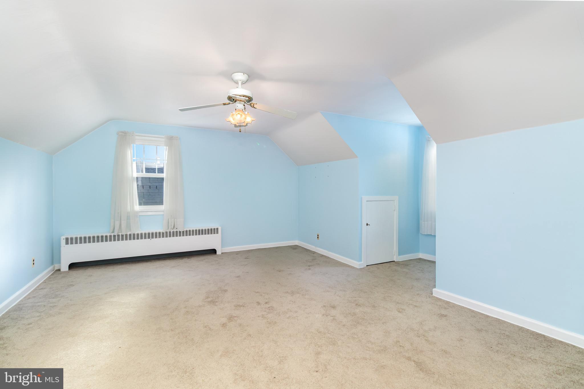 202 North Decatur Street Strasburg, PA 17579 - Photo 14 of 30 wooden floor in an empty room with a window