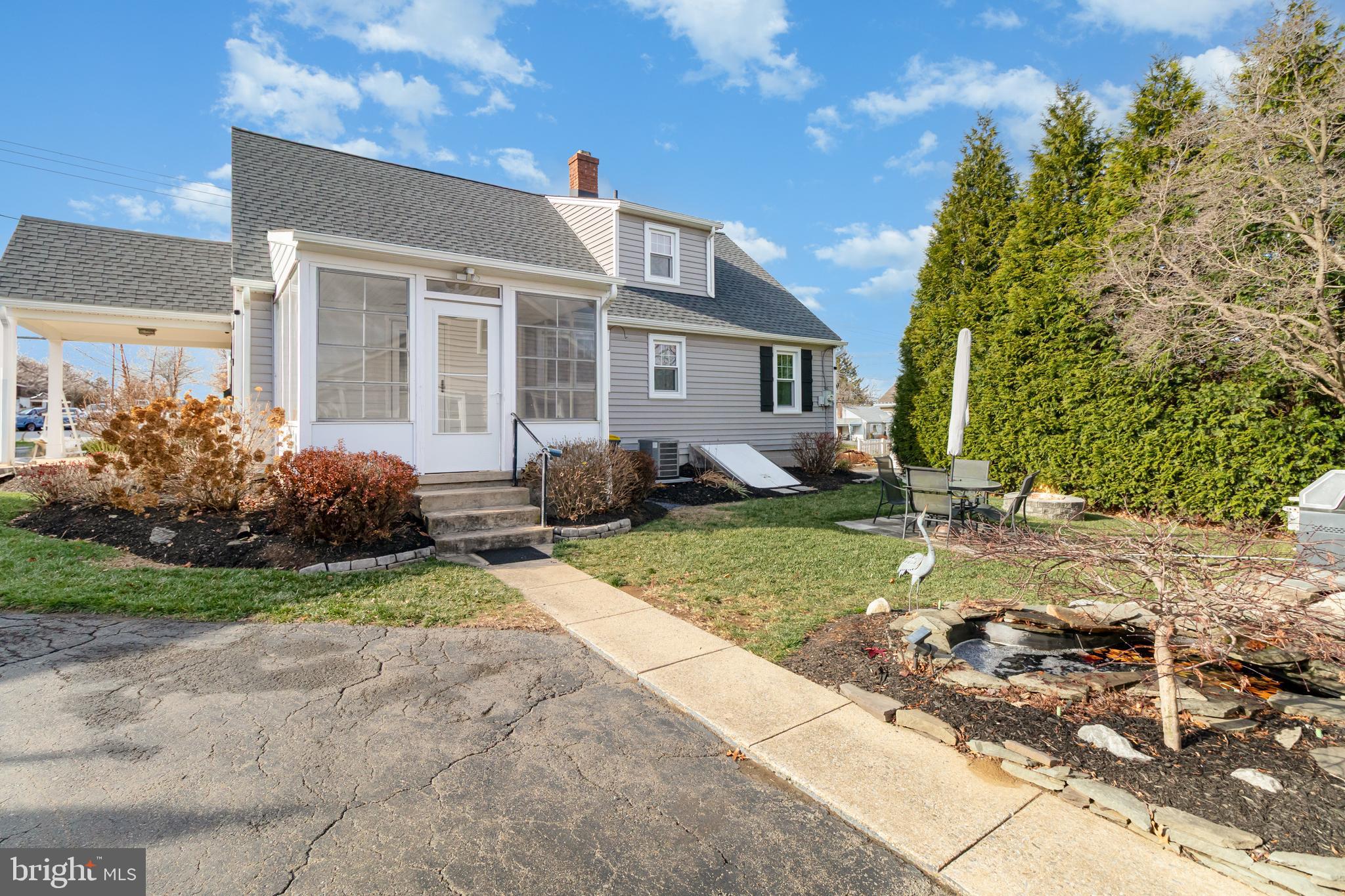 202 North Decatur Street Strasburg, PA 17579 - Photo 22 of 30 a front view of a house with garden