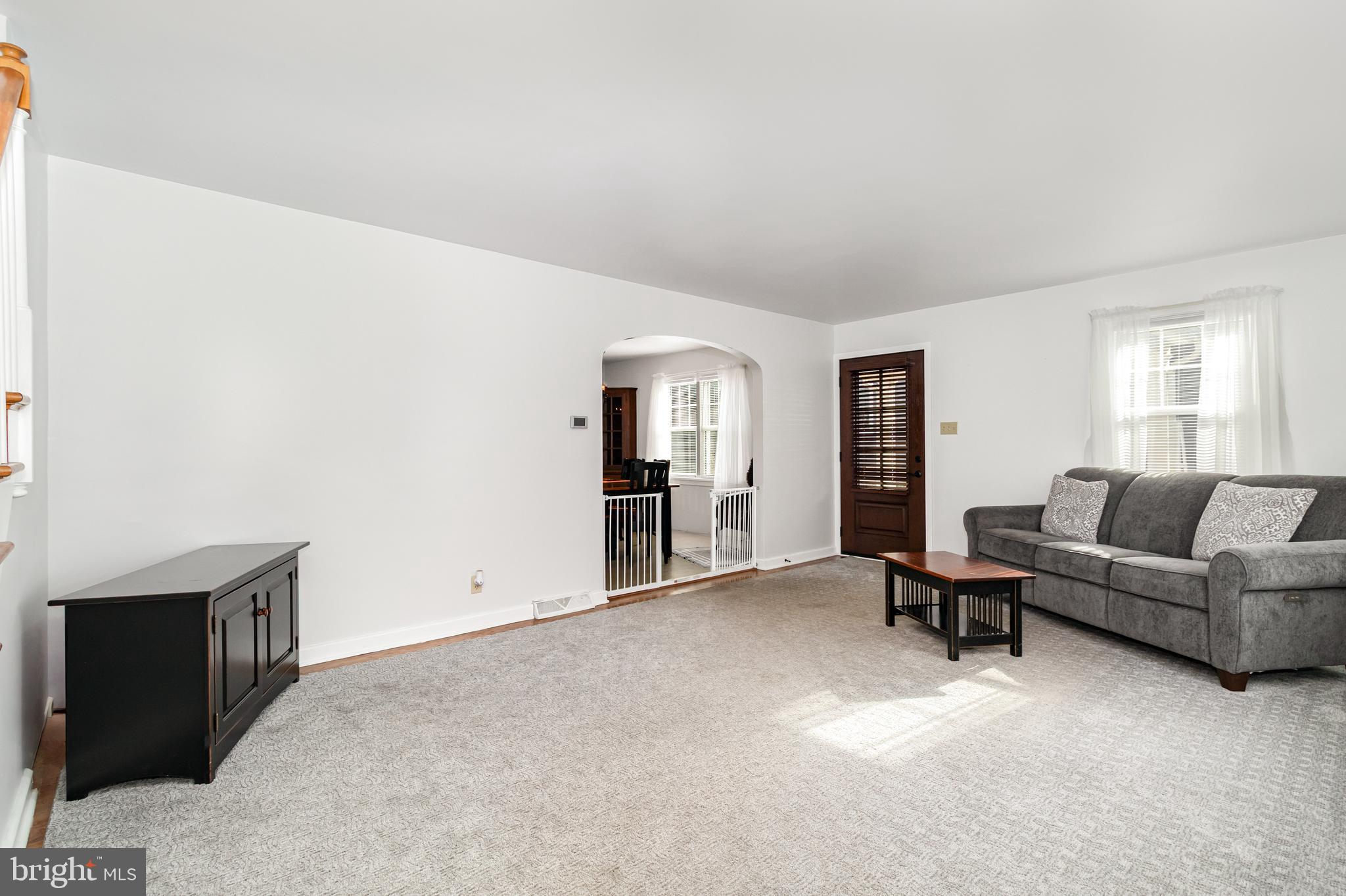202 North Decatur Street Strasburg, PA 17579 - Photo 5 of 30 a living room with furniture and a window