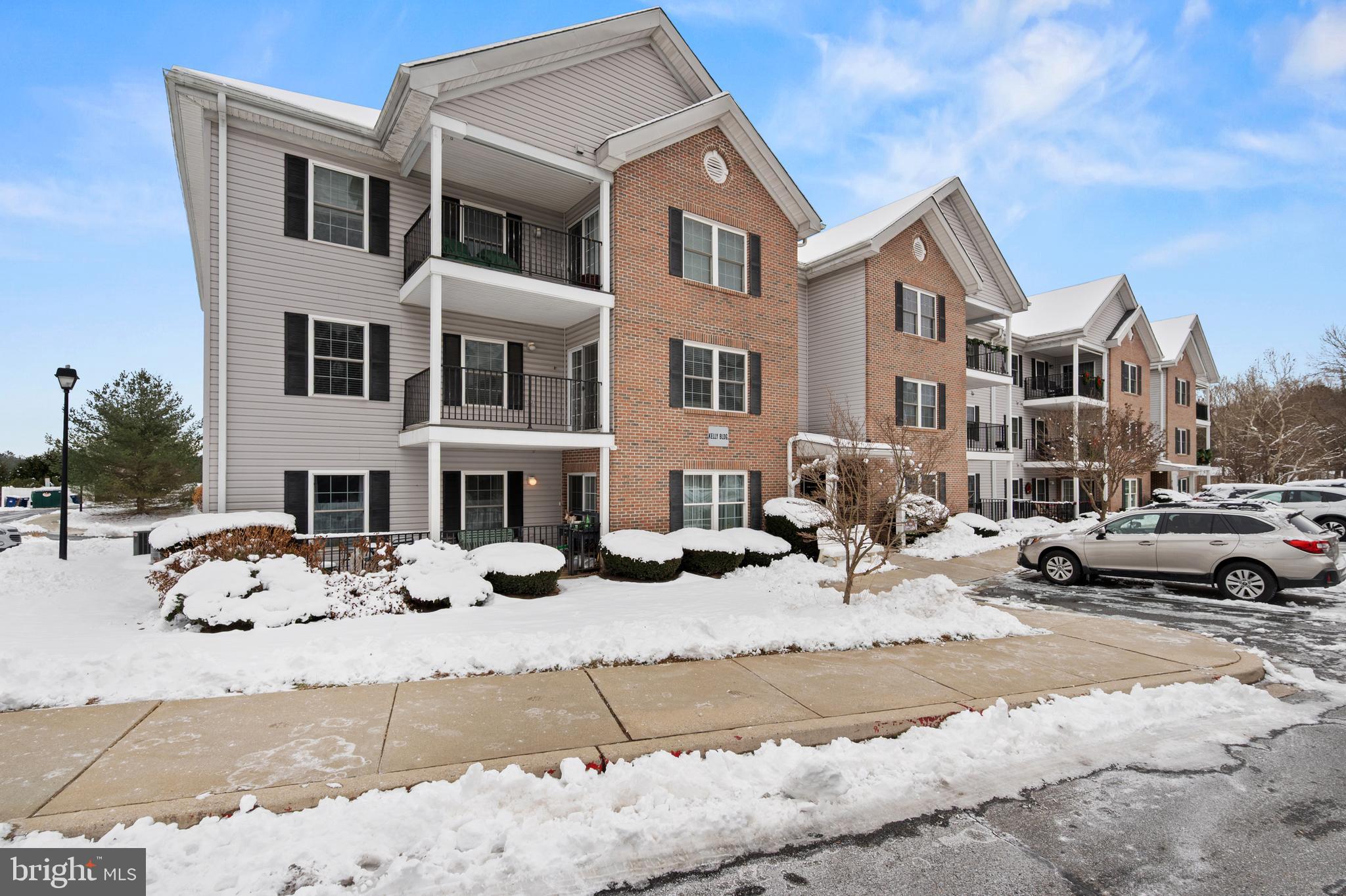 6508 Ridenour Way East, Unit 2A Sykesville, MD 21784 - Photo 20 of 20 a view of a street with buildings