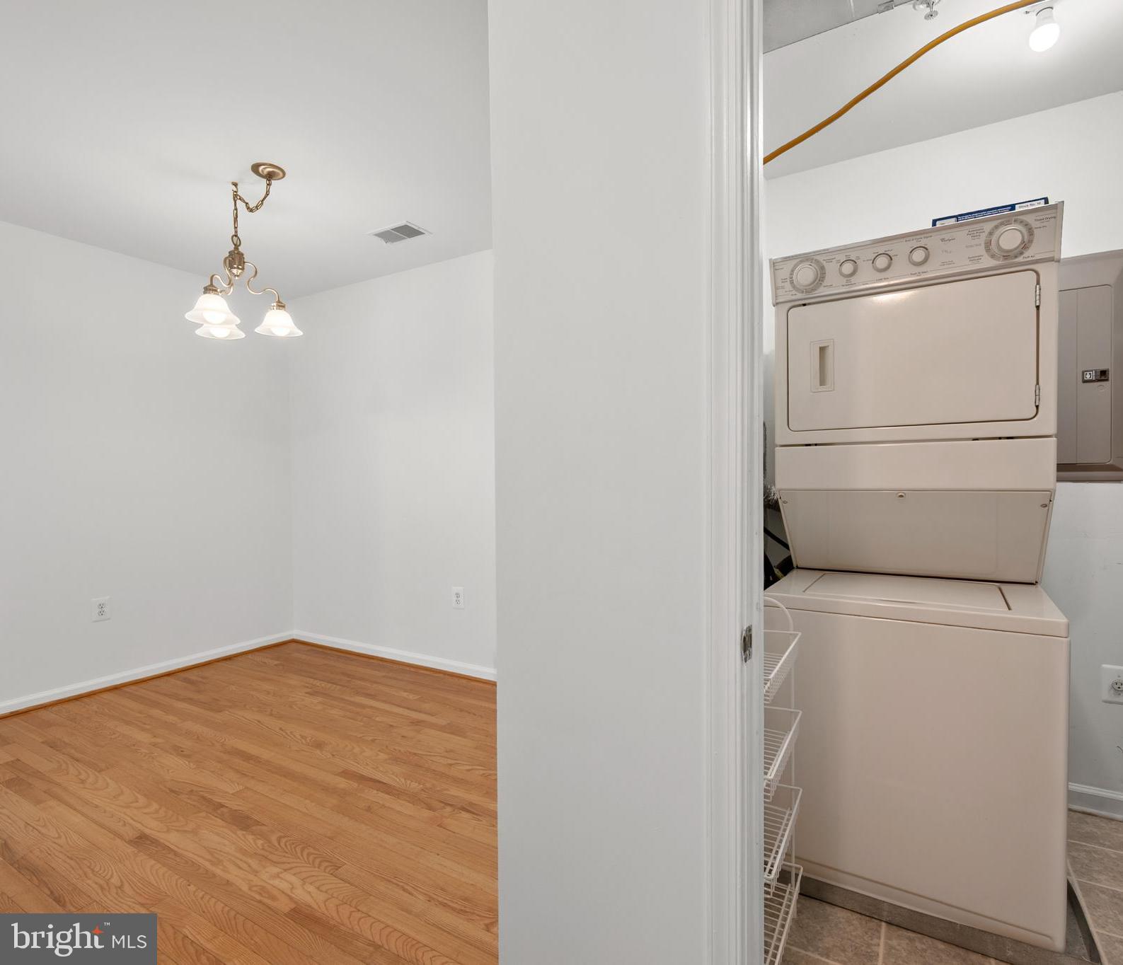 6508 Ridenour Way East, Unit 2A Sykesville, MD 21784 - Photo 10 of 20 a view of a storage & utility room with a washer dryer