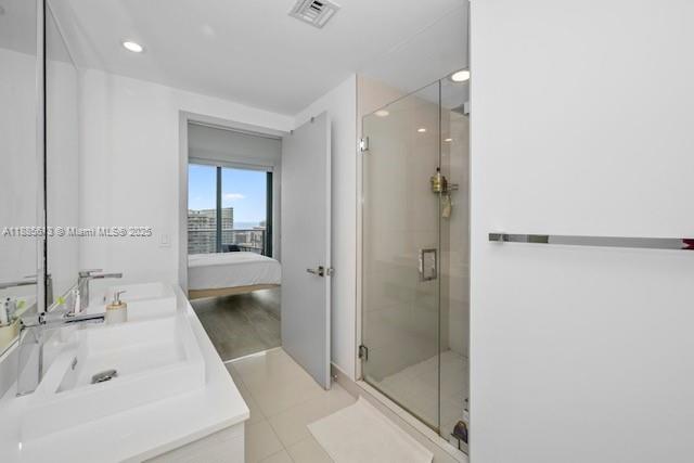 55 Southwest 9th Street, Unit 3506 Miami, FL 33130 - Photo 12 of 17 a bathroom with a sink and shower