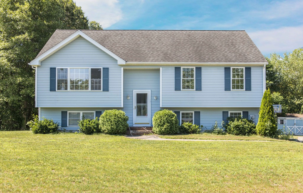 12 Hamilton Way Holbrook, MA 02343 - Photo 1 of 13 a front view of a house with a yard