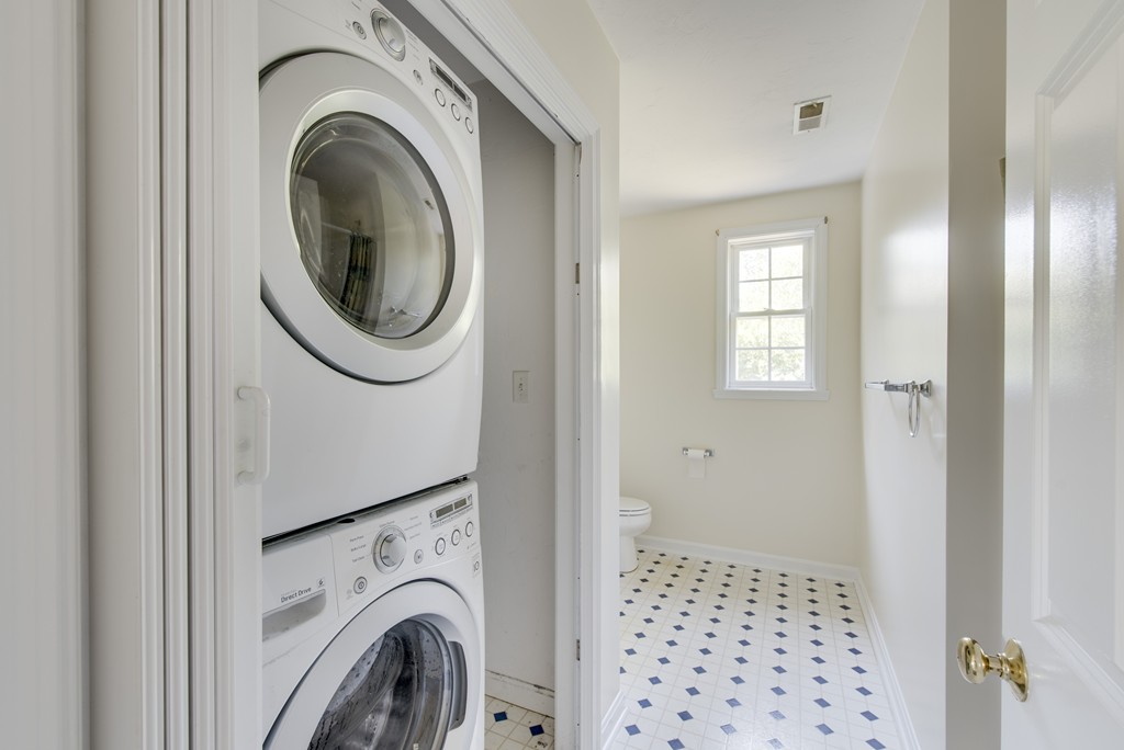 12 Hamilton Way Holbrook, MA 02343 - Photo 7 of 13 a view of a hallway with washer and dryer