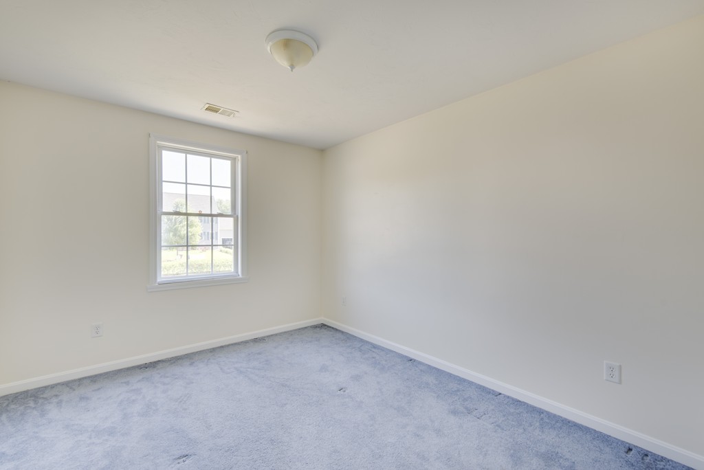 12 Hamilton Way Holbrook, MA 02343 - Photo 9 of 13 an empty room with a window