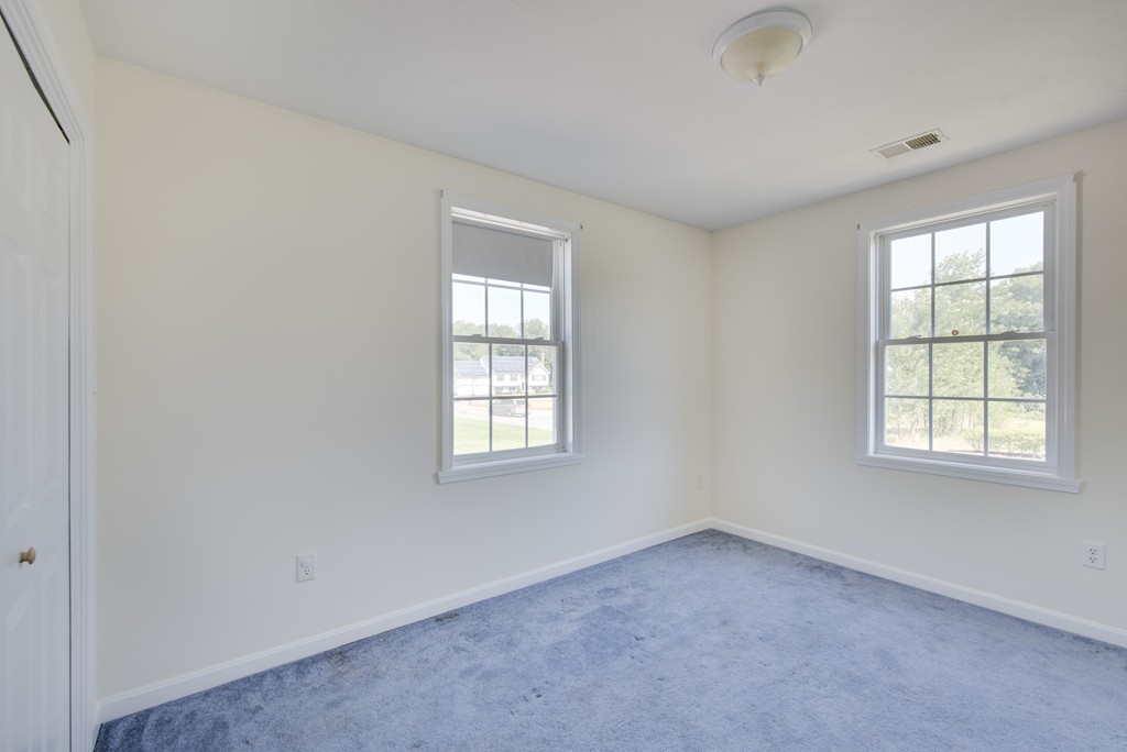 12 Hamilton Way Holbrook, MA 02343 - Photo 10 of 13 an empty room with windows