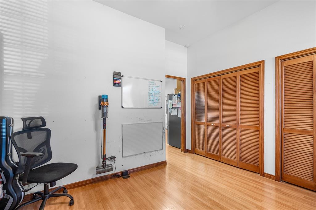 4502 Dexham Road Rowlett, TX 75088 - Photo 19 of 39 a view of a livingroom with furniture and wooden floor