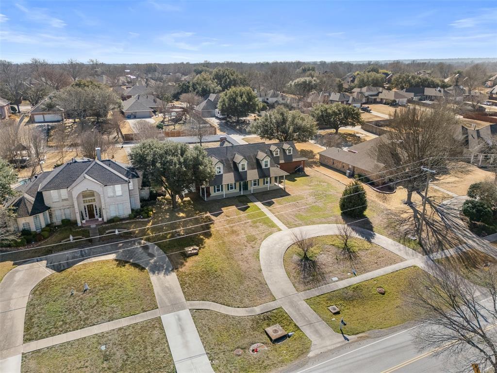 4502 Dexham Road Rowlett, TX 75088 - Photo 37 of 39 an aerial view of residential houses with outdoor space