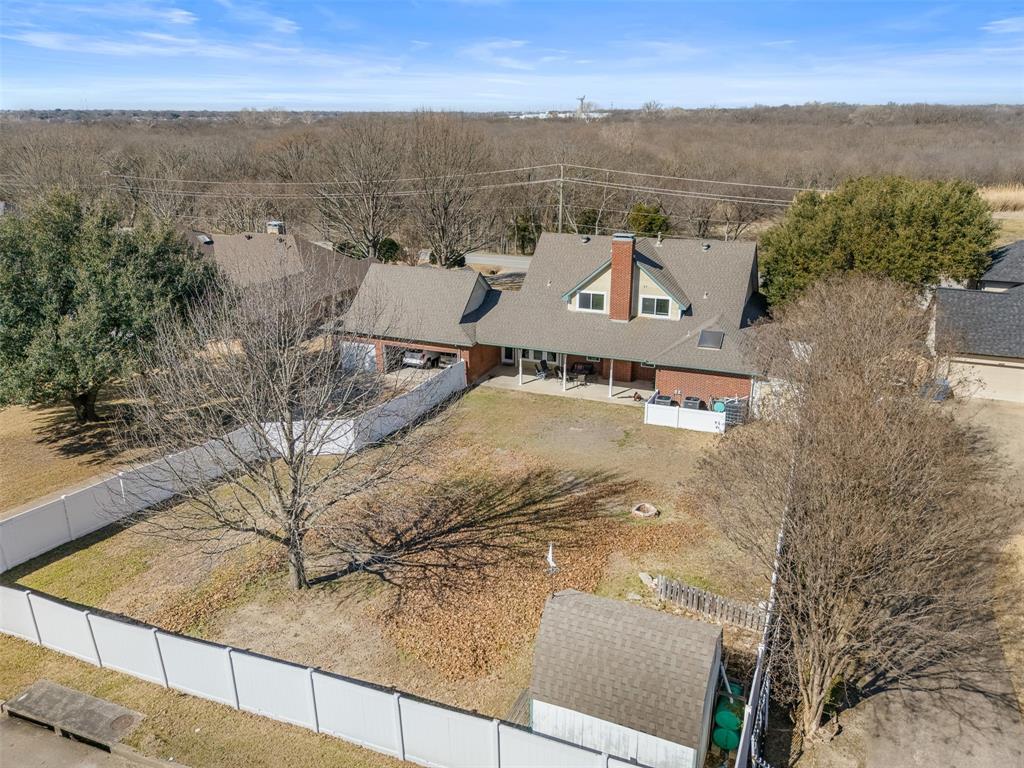 4502 Dexham Road Rowlett, TX 75088 - Photo 39 of 39 an aerial view of residential houses with outdoor space