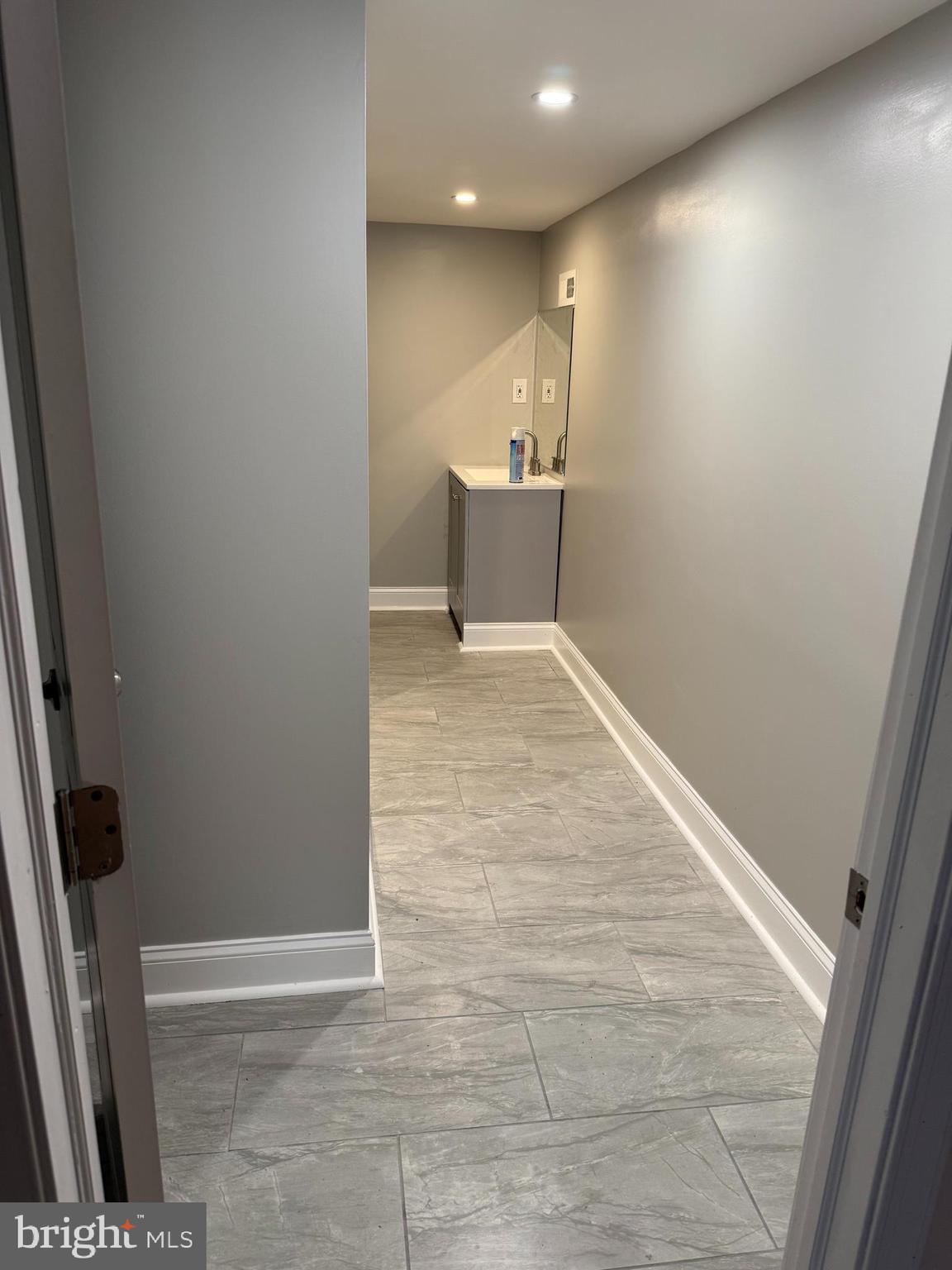 2921 Baker Street Baltimore, MD 21216 - Photo 4 of 7 a view of an empty room