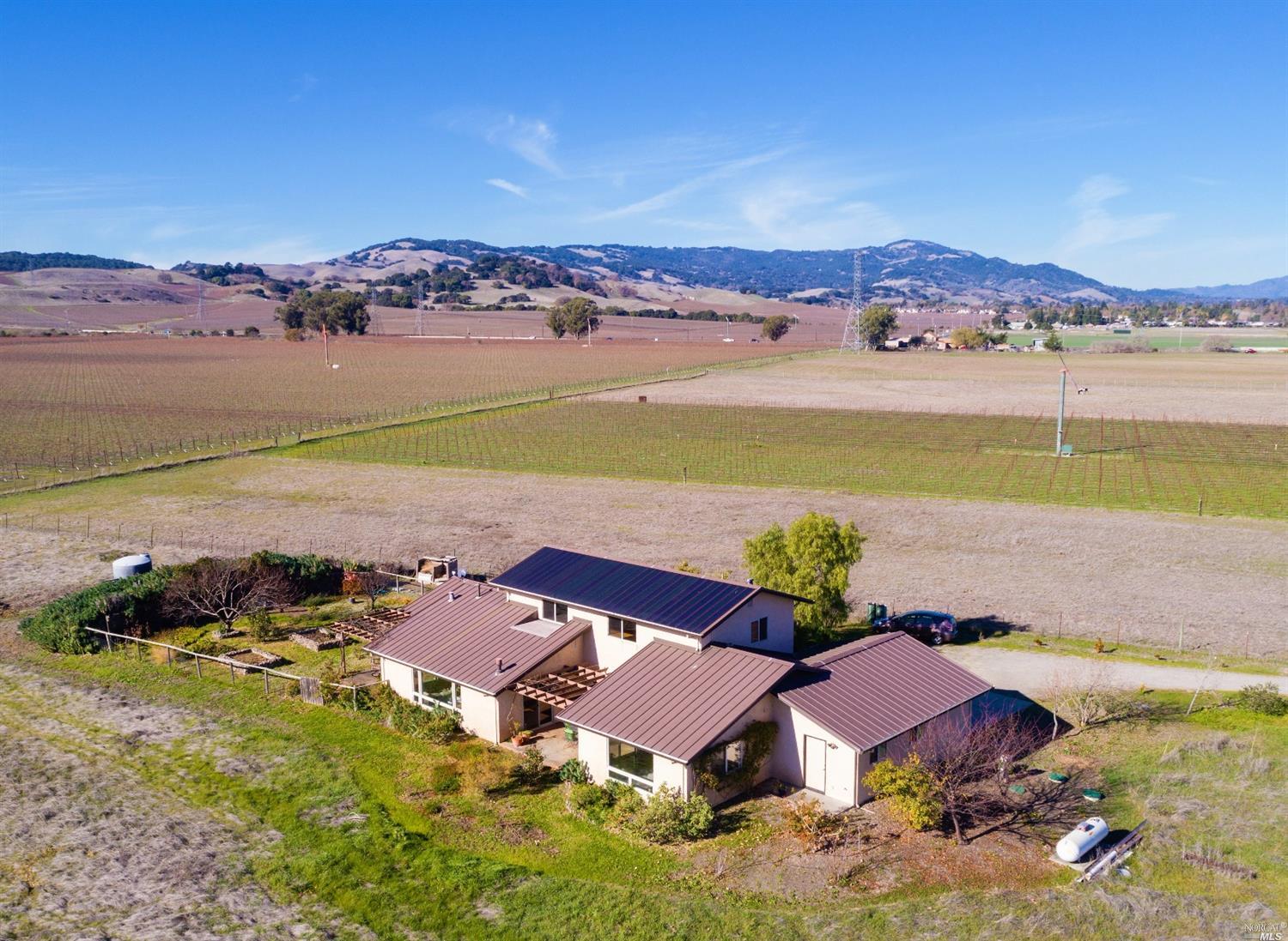 21885 Bonness Road Sonoma, CA 95476 - Photo 1 of 1 an aerial view of residential houses with outdoor space