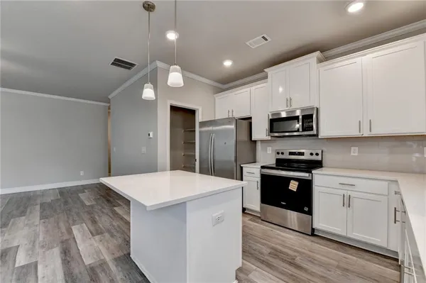 a view of entryway with wooden floor