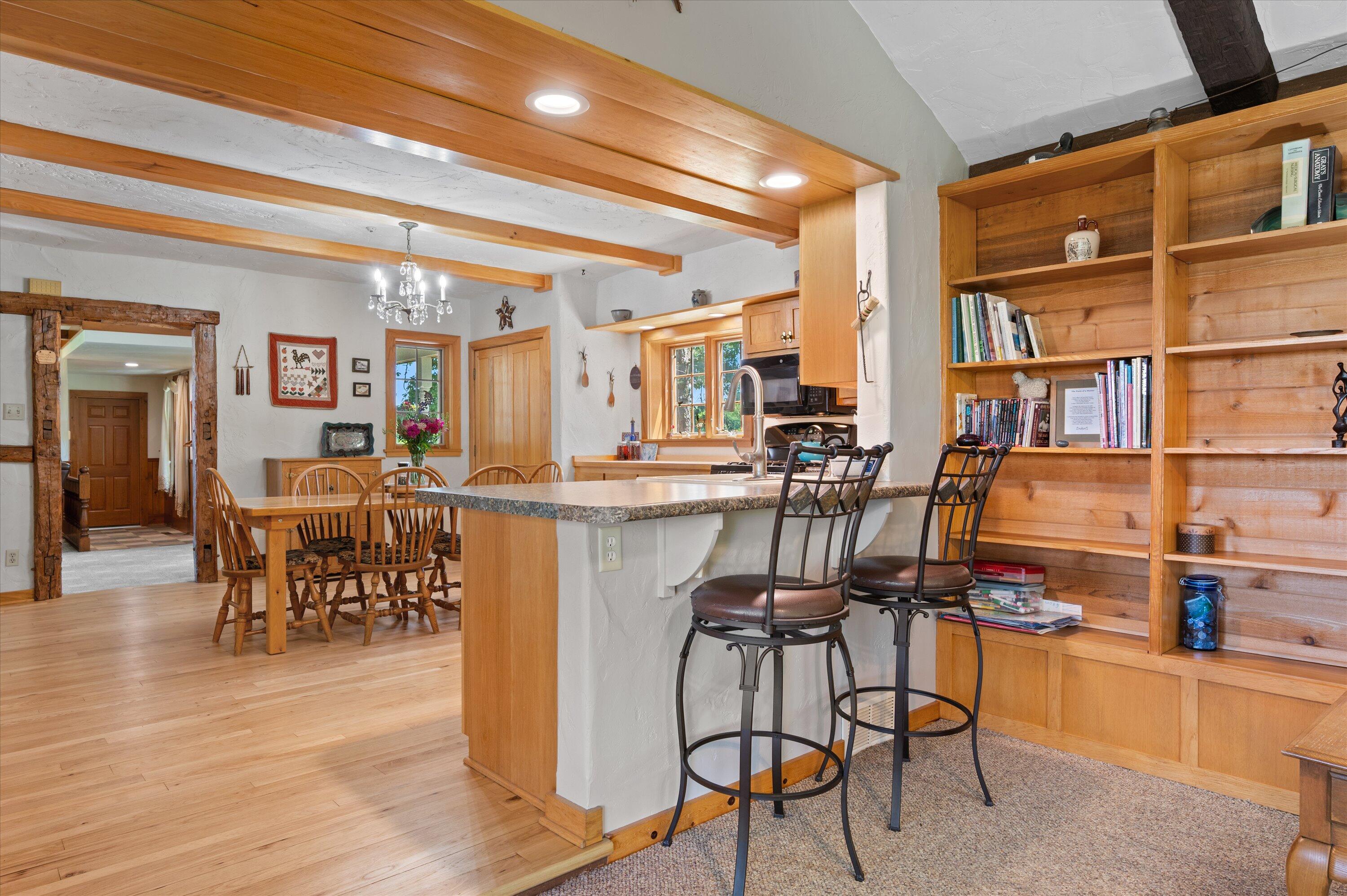 N9523 North River Road Ixonia, WI 53036 - Photo 14 of 55 Open to family room, great breakfast bar!