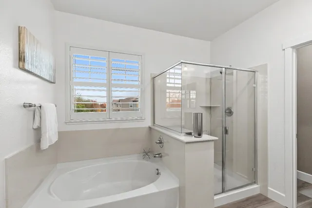 a view of yard with swimming pool and green space