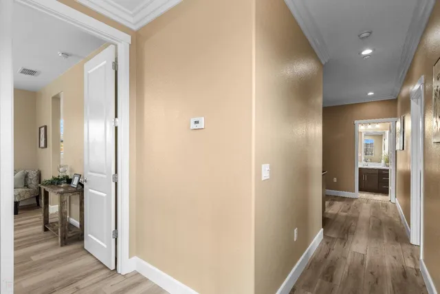 a view of a house with a yard and front view of a house