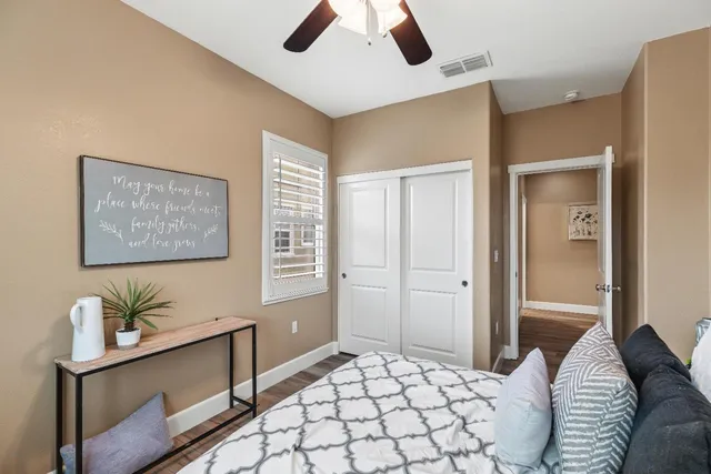 a view of a balcony with two chairs and a table