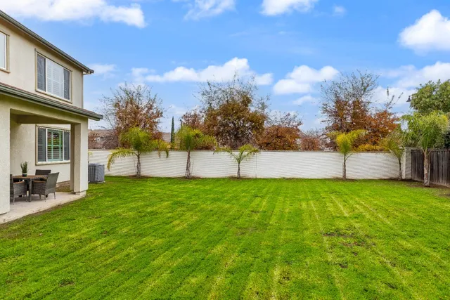 an aerial view of a house with a garden