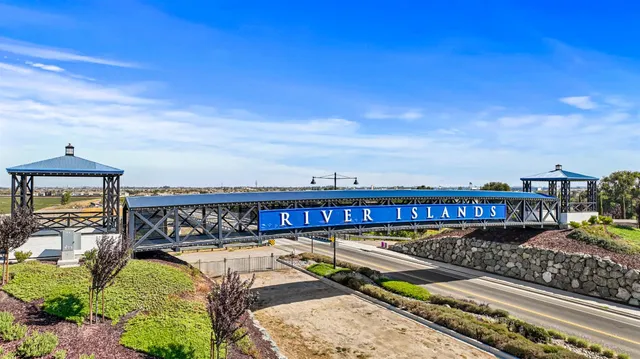 an aerial view of a swimming pool and outdoor seating