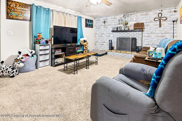 a room with lots of appliances and cabinets