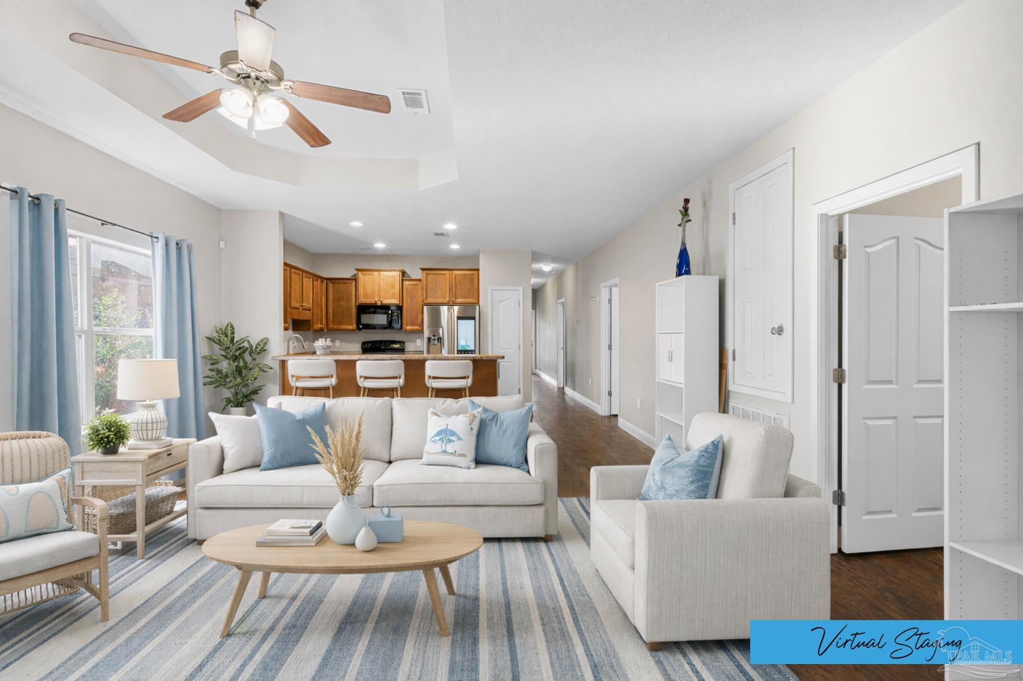 8855 Ridgebrook Court Pensacola, FL 32534 - Photo 12 of 37 a living room with furniture and a large window