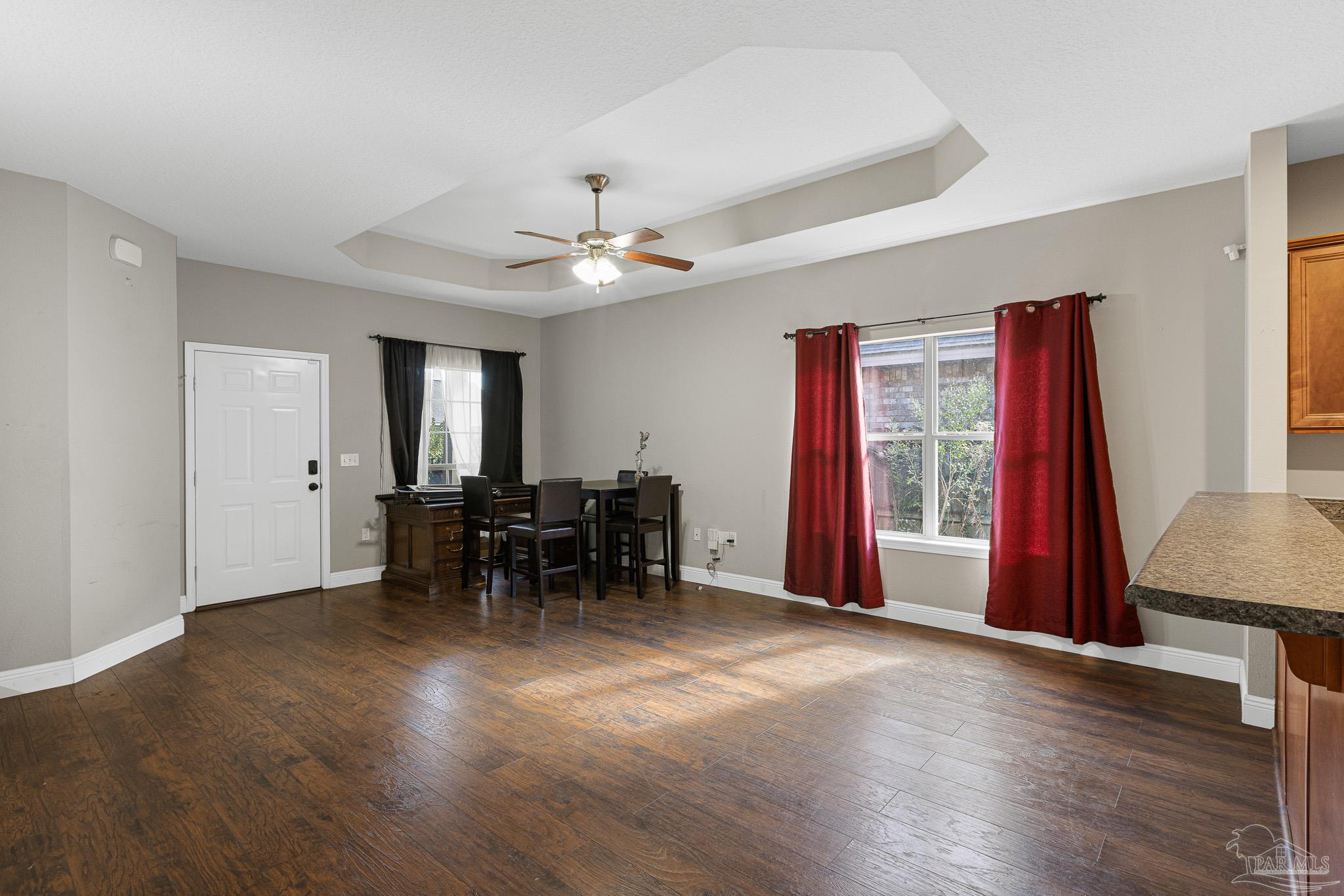 8855 Ridgebrook Court Pensacola, FL 32534 - Photo 14 of 37 a view of livingroom with furniture window and front door