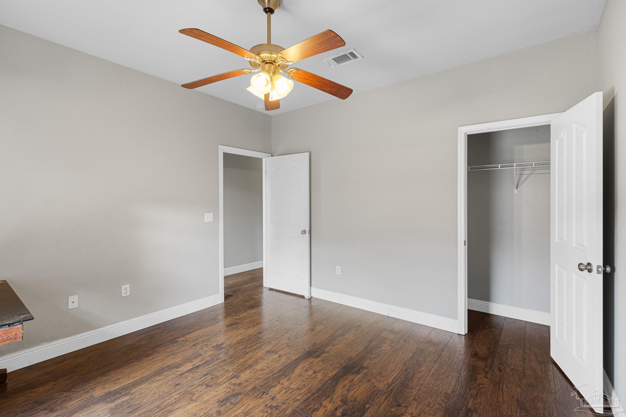 8855 Ridgebrook Court Pensacola, FL 32534 - Photo 30 of 37 wooden floor in an empty room with a window