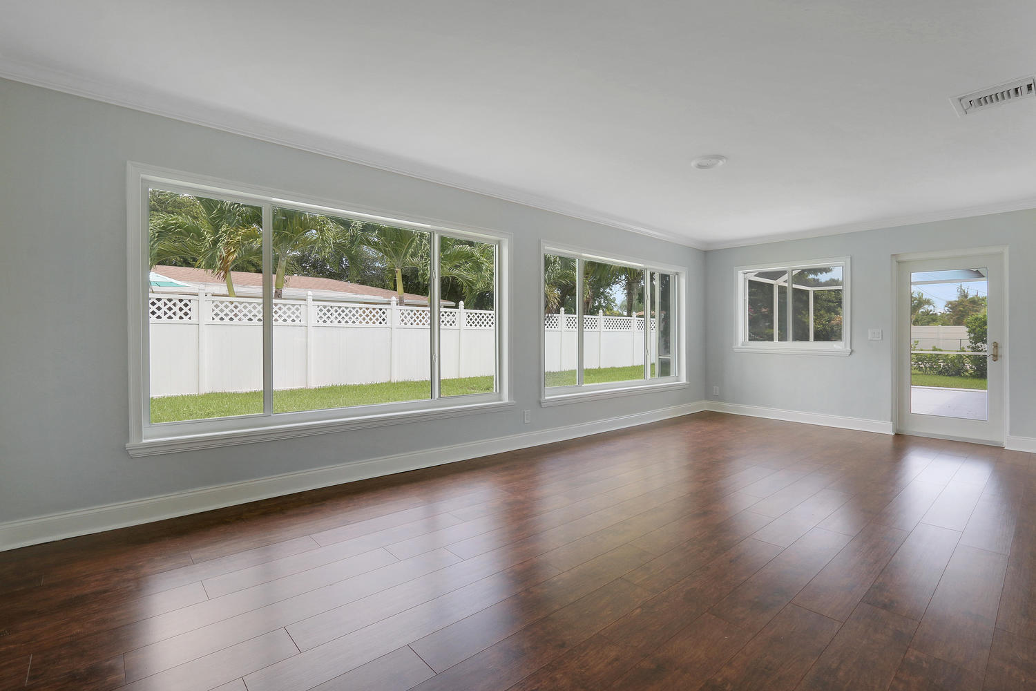 501 Harbour Road North Palm Beach, FL 33408 - Photo 8 of 20 a view of empty room with wooden floor and fan