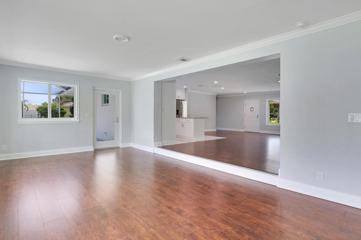 501 Harbour Road North Palm Beach, FL 33408 - Photo 9 of 20 a view of empty room with wooden floor and fan