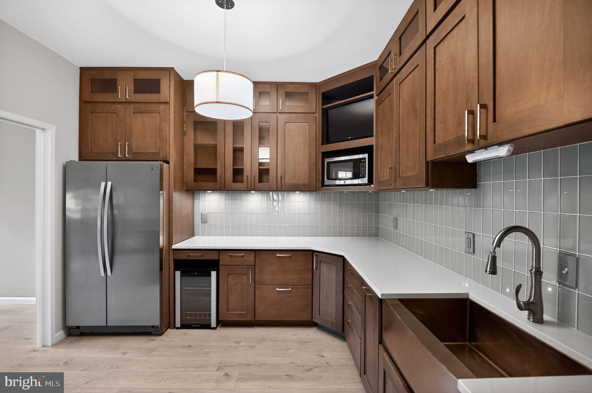 2114 Green Watch Way, Unit 10/201E Reston, VA 20191 - Photo 6 of 31 Custom Kitchen renovation with real wood cabinets