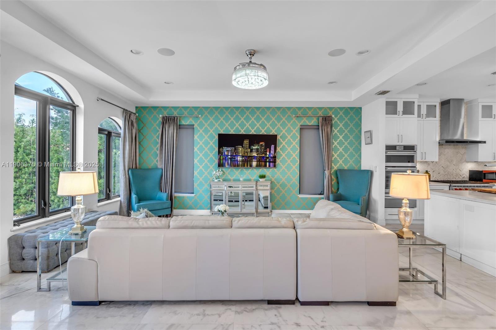 2085 Keystone Boulevard North Miami, FL 33181 - Photo 12 of 77 a living room with furniture and a large window