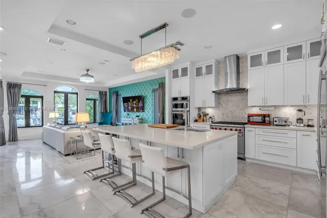 a bed room with a bed and a television