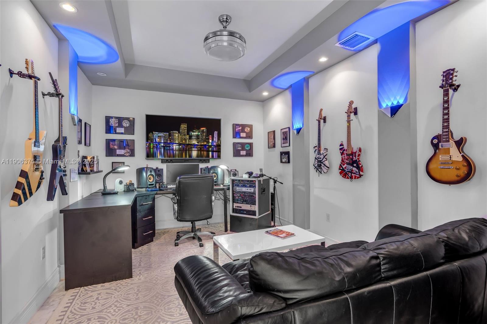 2085 Keystone Boulevard North Miami, FL 33181 - Photo 21 of 77 a room with furniture a chandelier and a view of kitchen