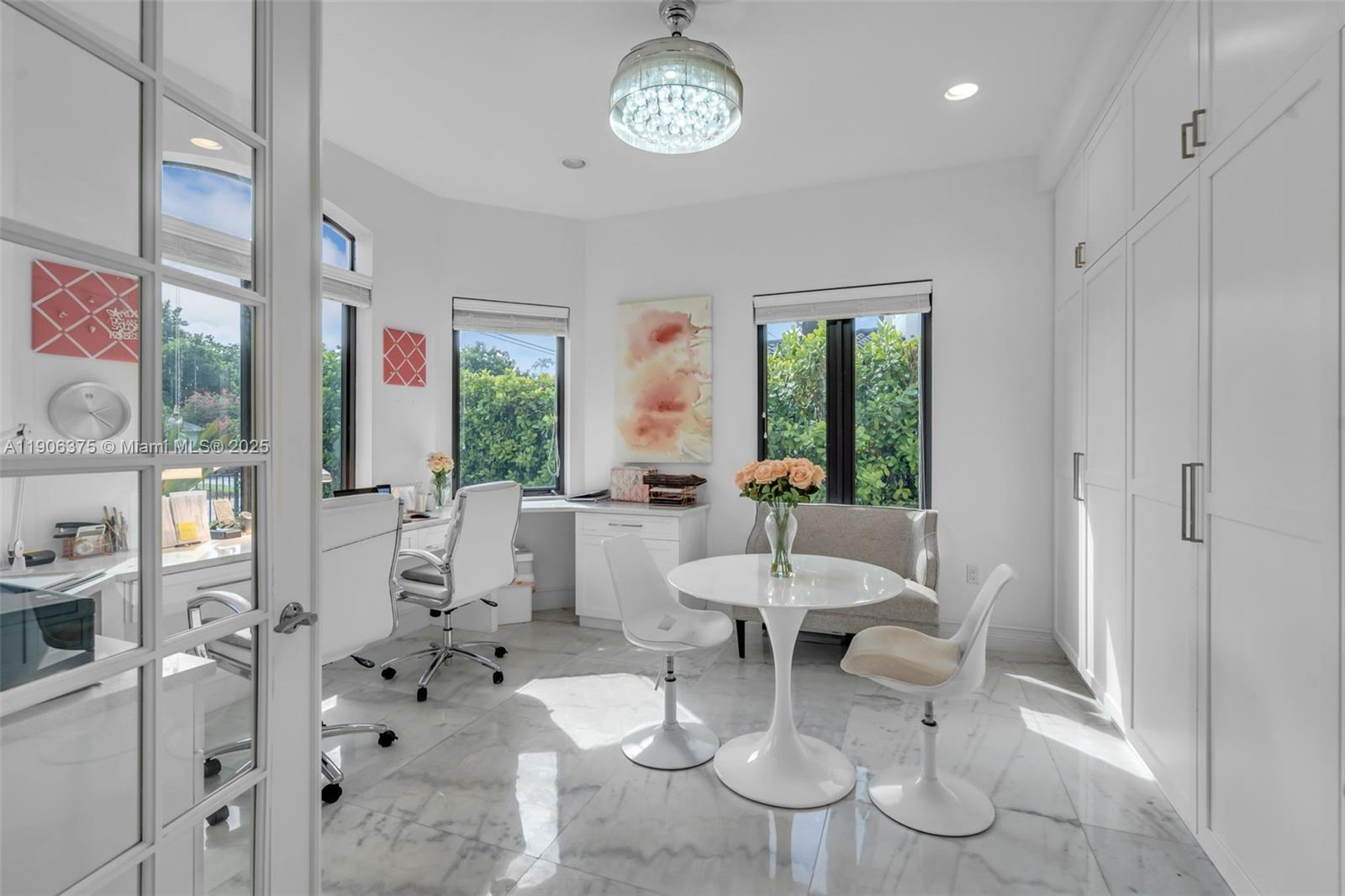 2085 Keystone Boulevard North Miami, FL 33181 - Photo 22 of 77 a view of a dining room with furniture window and outside view