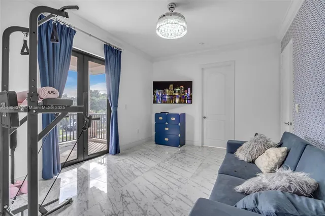 an aerial view of residential houses with outdoor space and river view