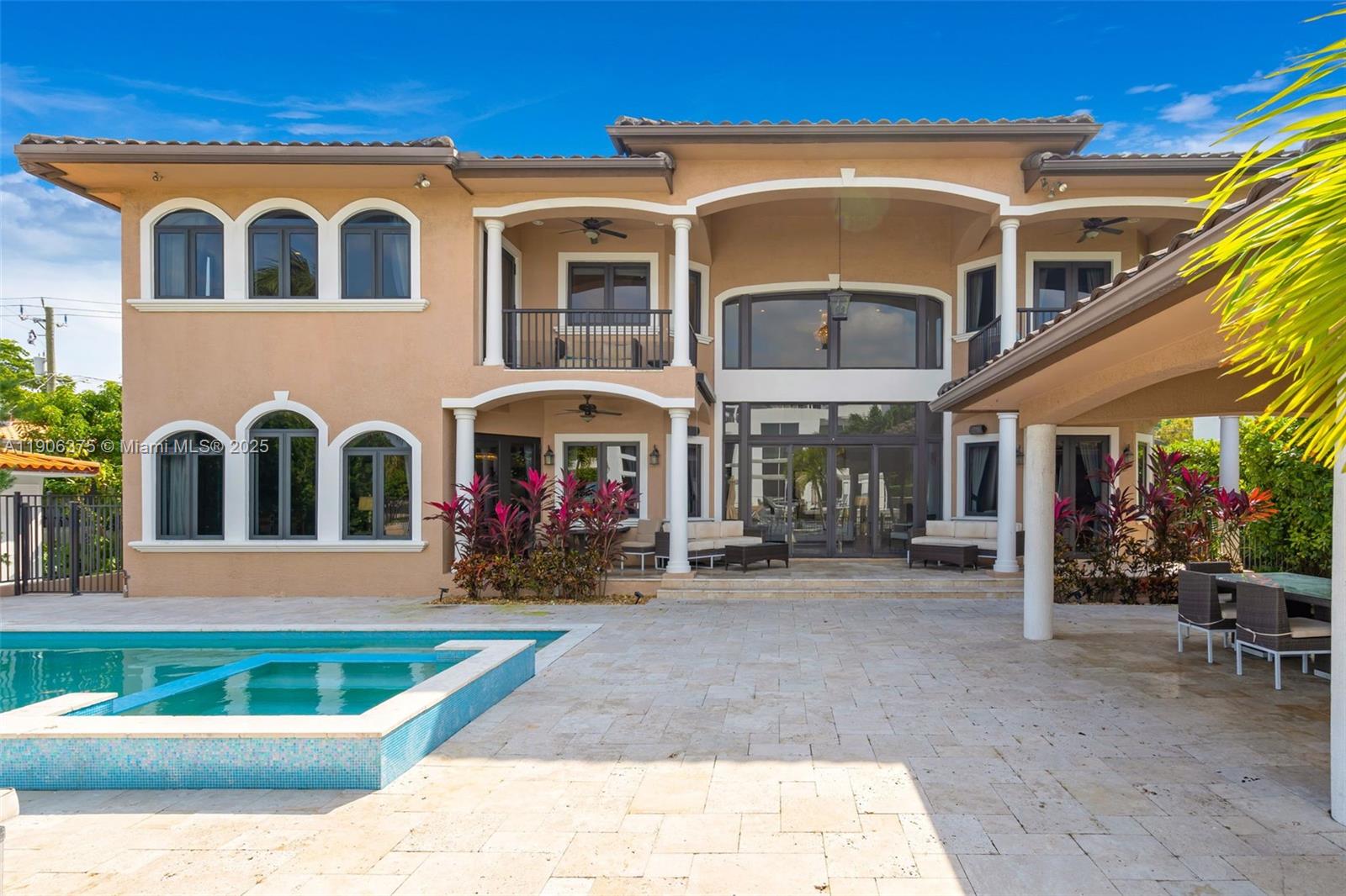 2085 Keystone Boulevard North Miami, FL 33181 - Photo 46 of 77 a front view of a house with a yard