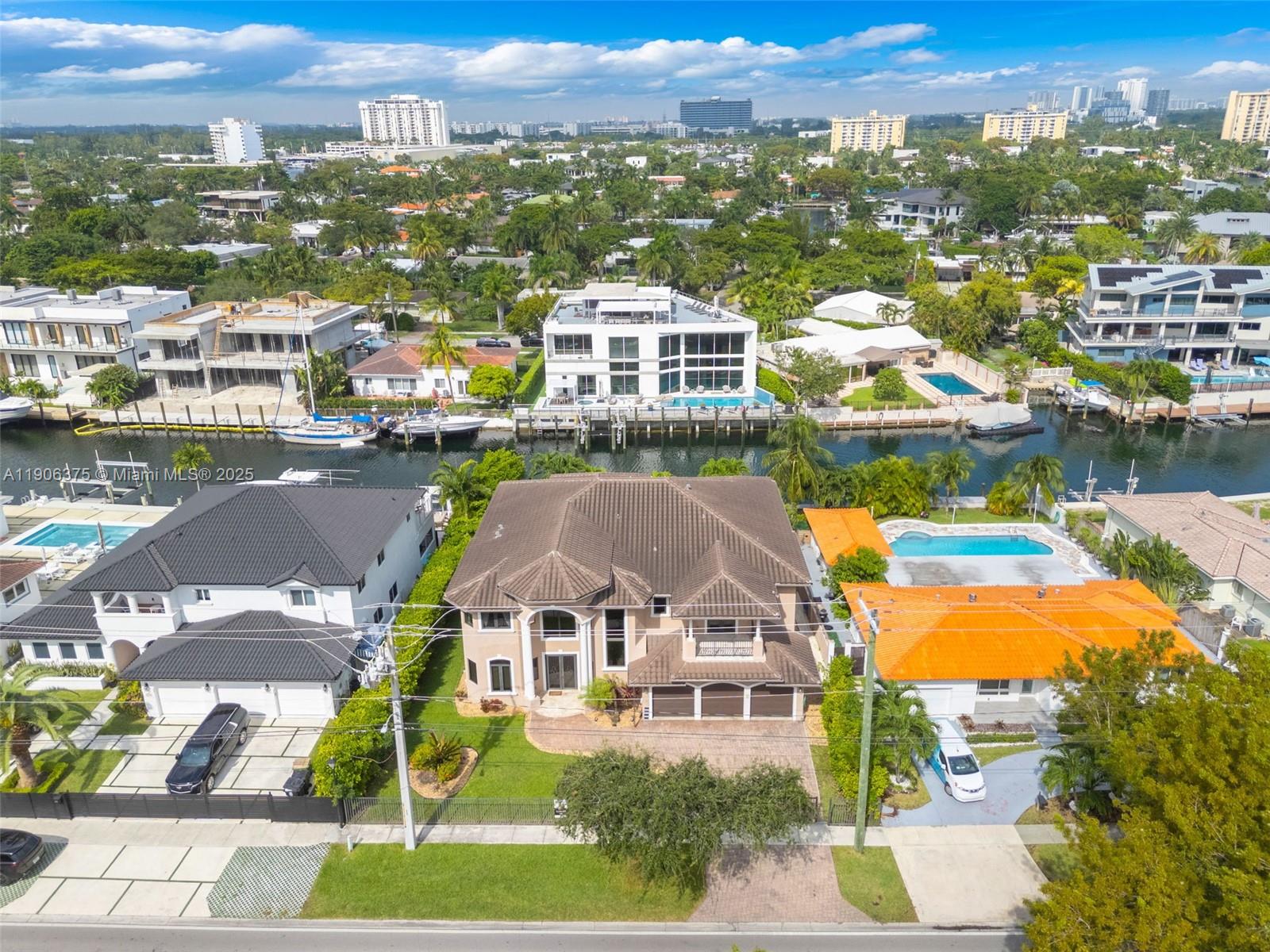 2085 Keystone Boulevard North Miami, FL 33181 - Photo 60 of 77 an aerial view of residential houses with outdoor space and river view