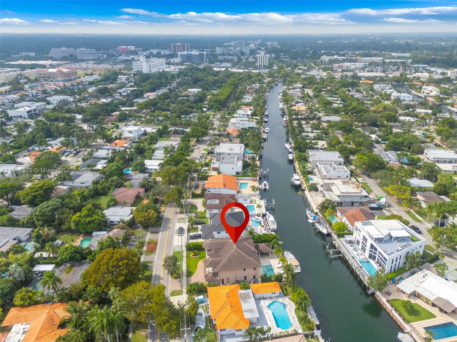 2085 Keystone Boulevard North Miami, FL 33181 - Photo 63 of 77 an aerial view of residential houses with outdoor space and parking