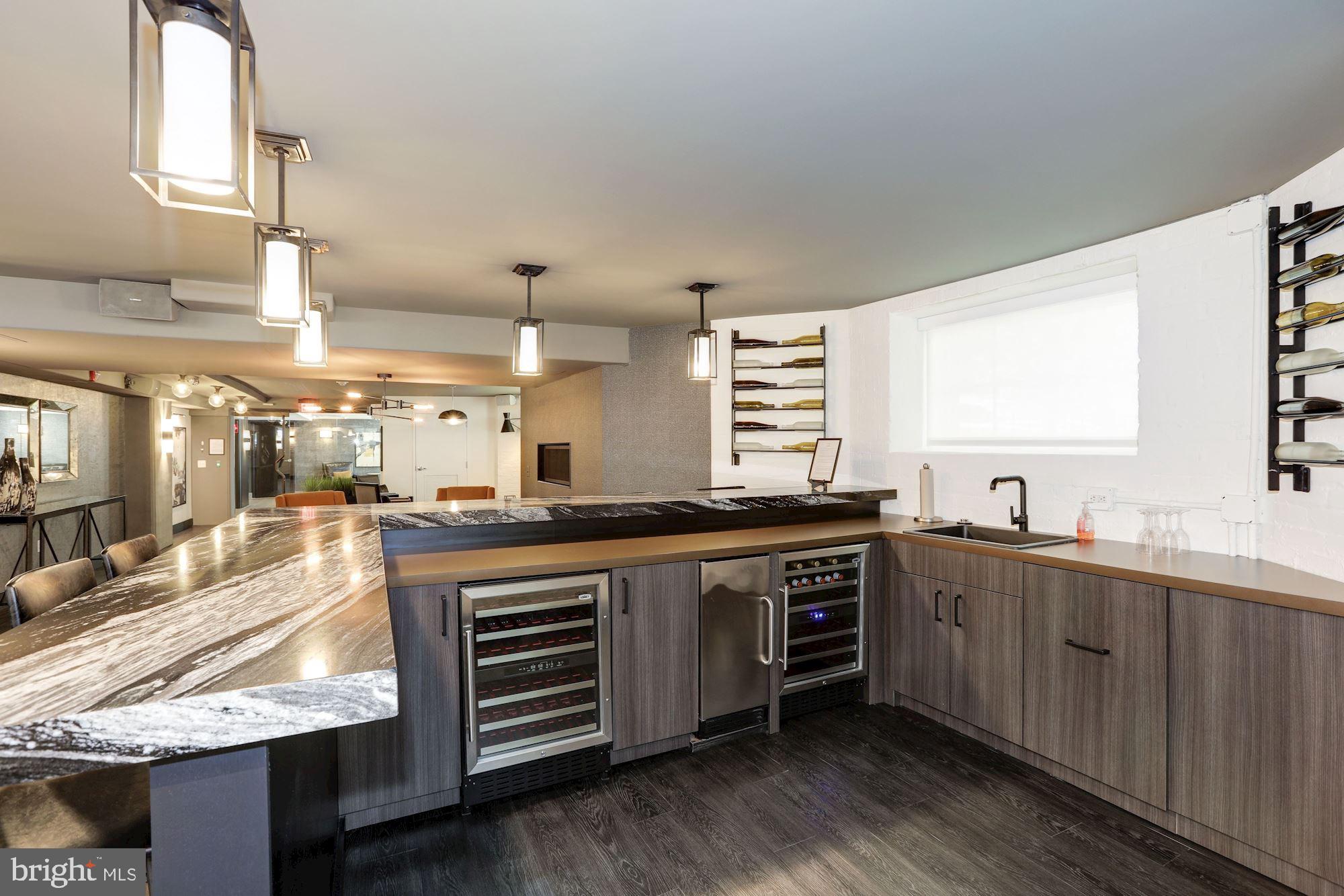 1801 16th Street Northwest, Unit 203 Washington, DC 20009 - Photo 15 of 21 with wet bar perfect for entertaining