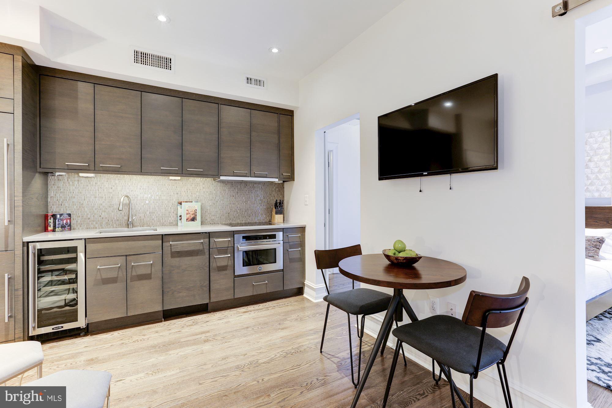 1801 16th Street Northwest, Unit 203 Washington, DC 20009 - Photo 3 of 21 that flows into a separate dining area